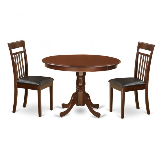 3 Pc Set With A Round Kitchen Table And 2 Leather Kitchen Chairs In Mahogany