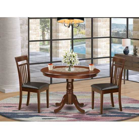 3 Pc Set With A Round Kitchen Table And 2 Leather Kitchen Chairs In Mahogany