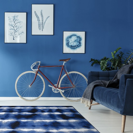 Sound Off 7'8" x 10'9" area rug in color Cobalt