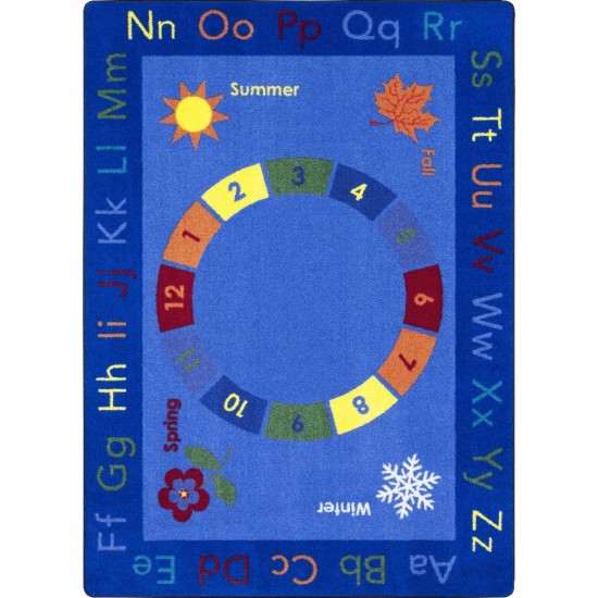 Learn Through the Seasons 5'4" x 7'8" area rug in color Multi