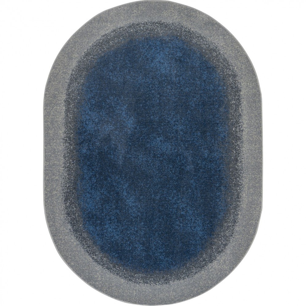 Grounded 5'4" x 7'8" Oval area rug in color Marine