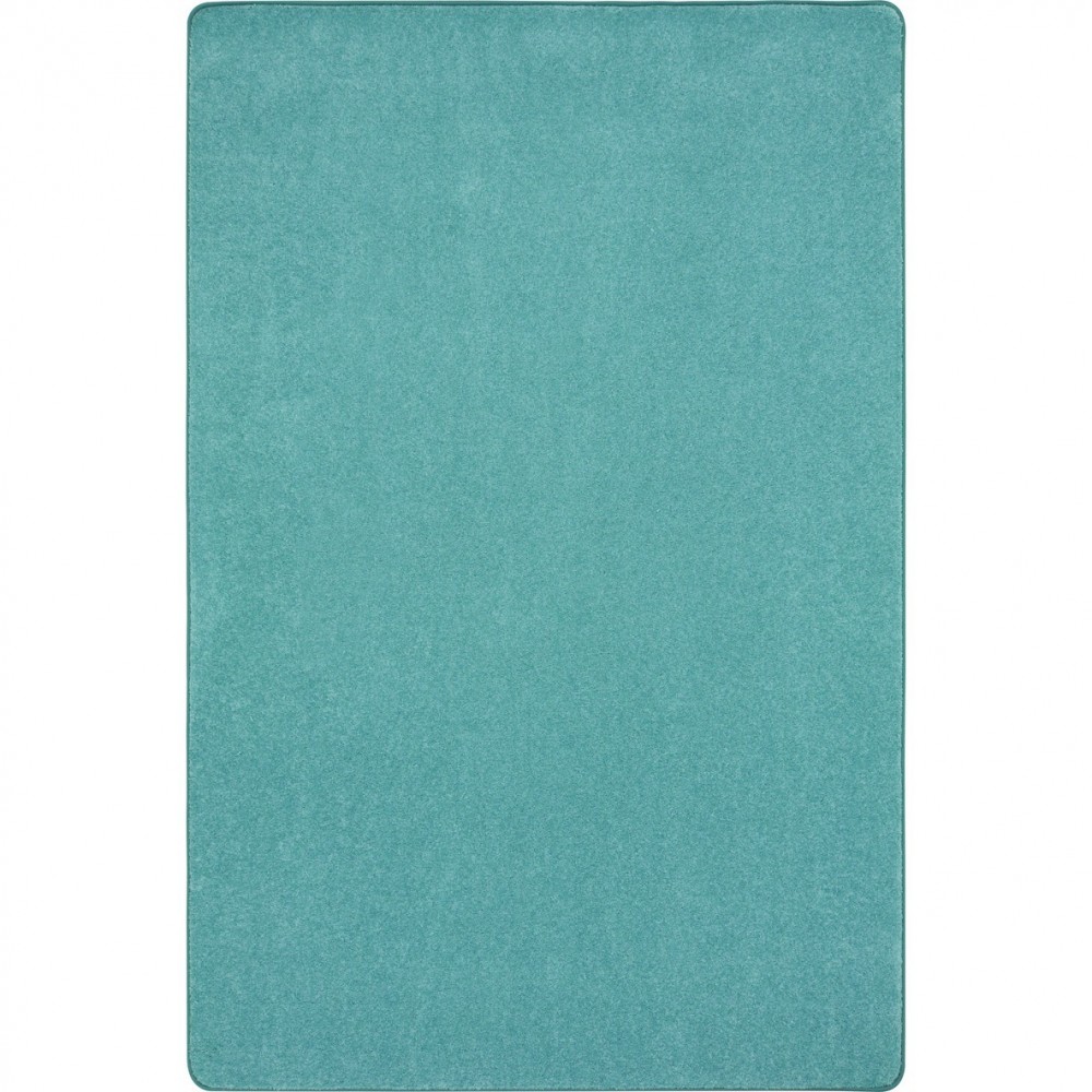 Just Kidding 6' x 9' area rug in color Seafoam