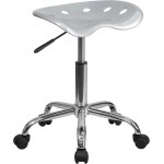 Vibrant Silver Tractor Seat and Chrome Stool