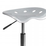 Vibrant Silver Tractor Seat and Chrome Stool