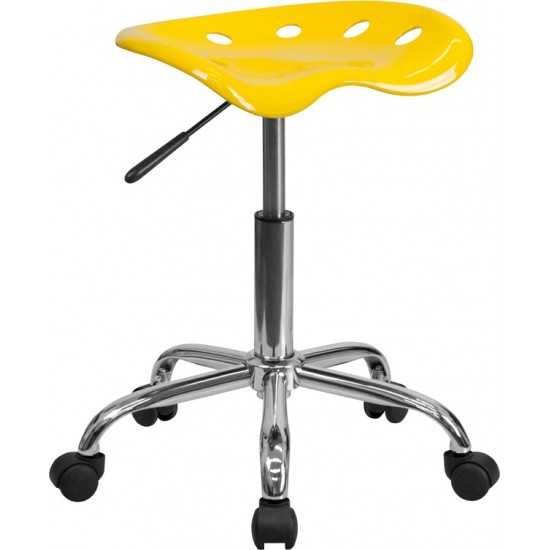 Vibrant Yellow Tractor Seat and Chrome Stool