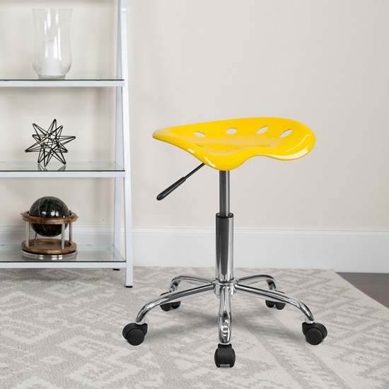 Vibrant Yellow Tractor Seat and Chrome Stool