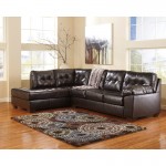 Signature Design by Ashley Alliston with Left Side Facing Chaise Sectional in Chocolate Faux Leather