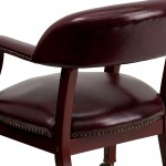Oxblood Vinyl Luxurious Conference Chair with Accent Nail Trim and Casters