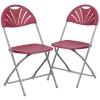 2 Pack 650 lb. Capacity Burgundy Plastic Fan Back Folding Chair